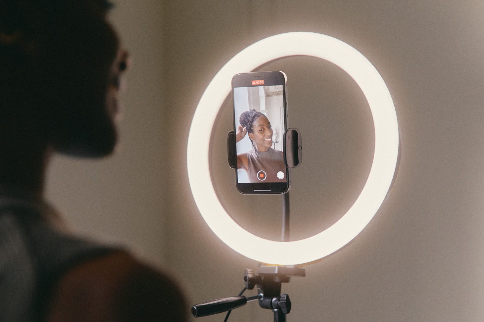 A phone recording on a ring light